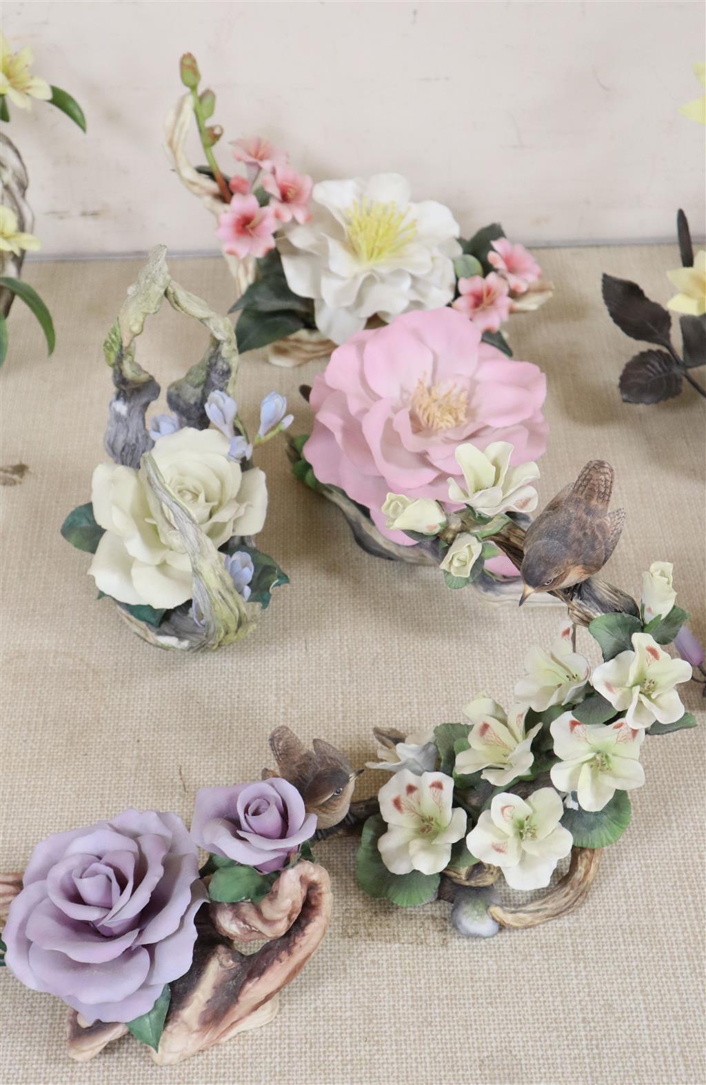 Five Boehm porcelain flower groups - Blue Nile Rose no.183, Pelargonium no.42, Pascal Rose with Freisas no.195, Annenberg Rose